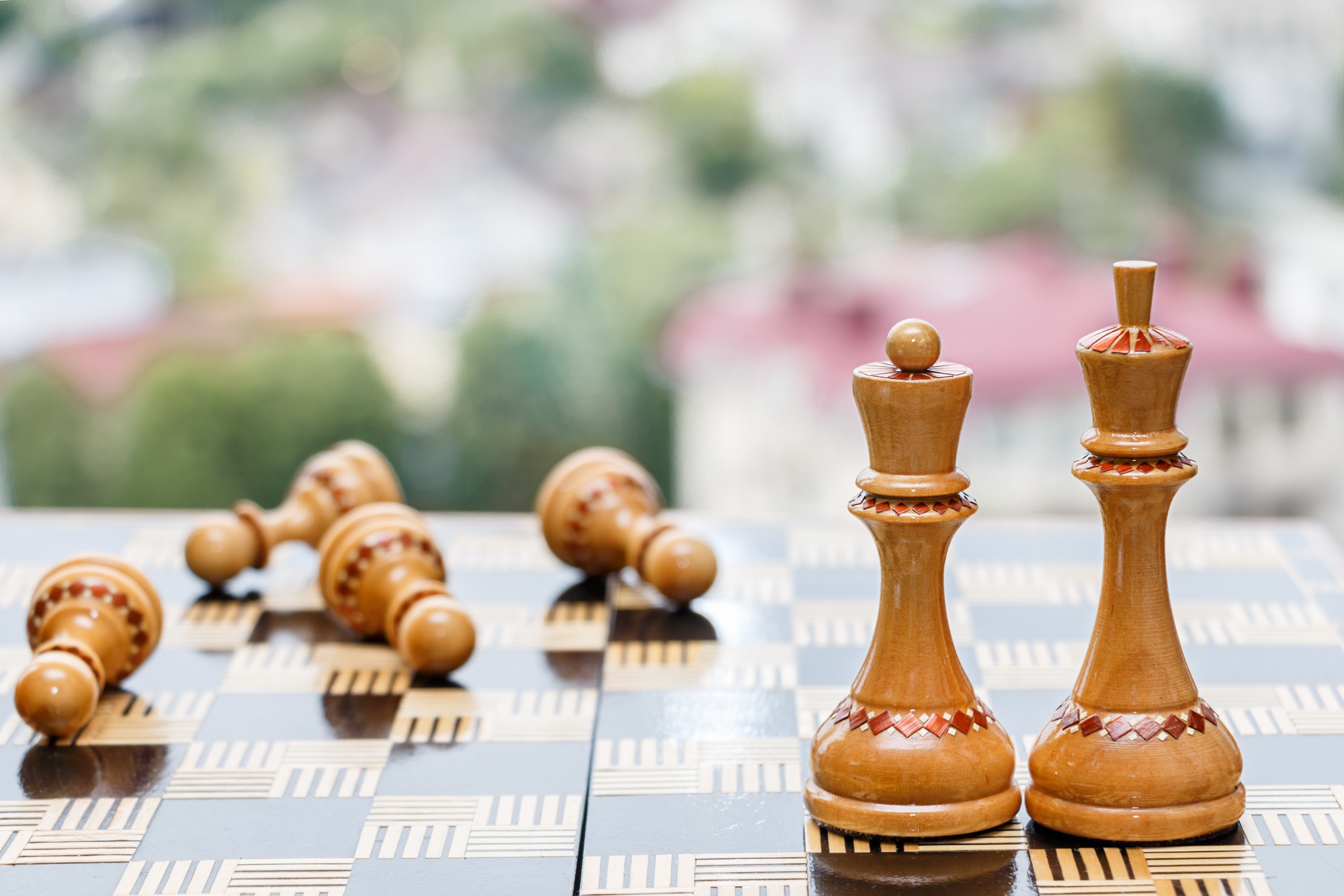 Chess pieces scattered on the chessboard and free space for text